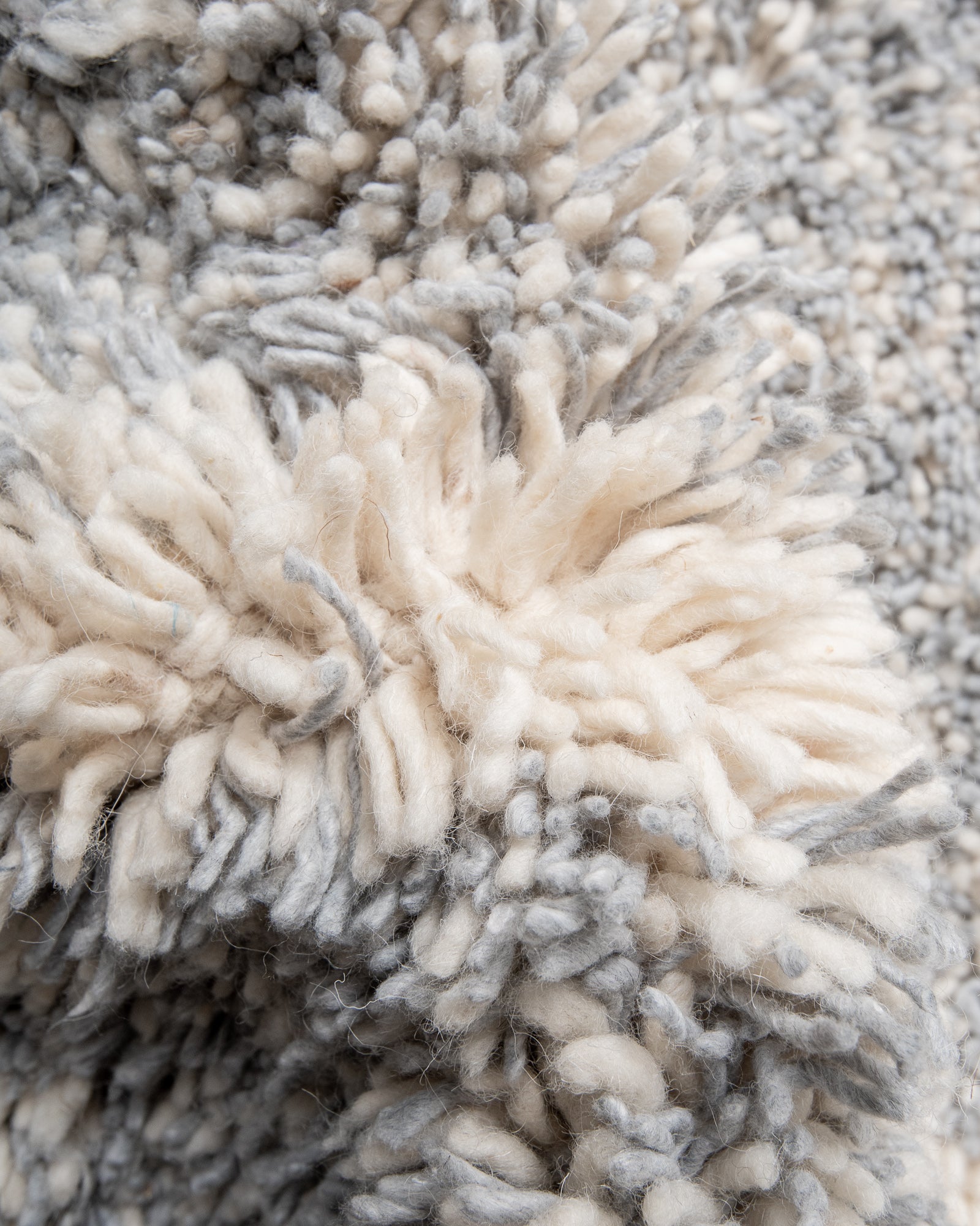 Modern, designer, handcrafted Berber rug from Morocco. Beniourain carpet with beautiful colours and patterns and fluffy wool texture.